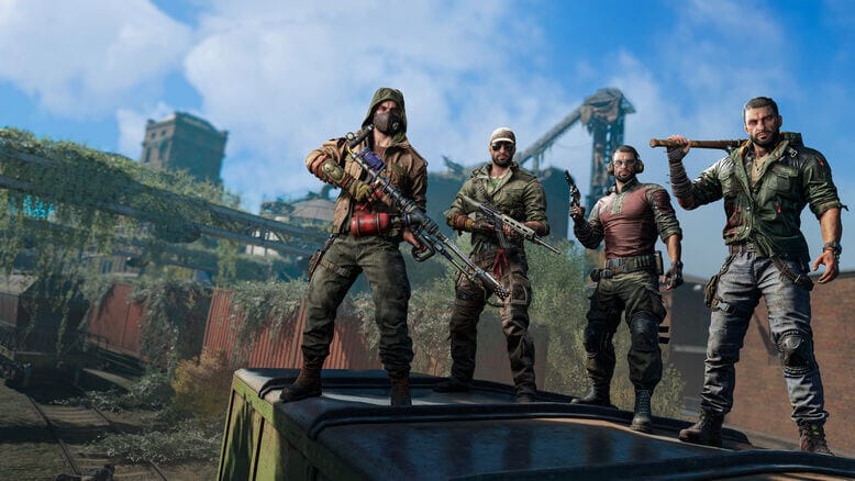 Dying Light: The Beast gameplay screenshot showing a survivor aiming a weapon at a massive mutant surrounded by zombies in a fiery, chaotic battle scene.