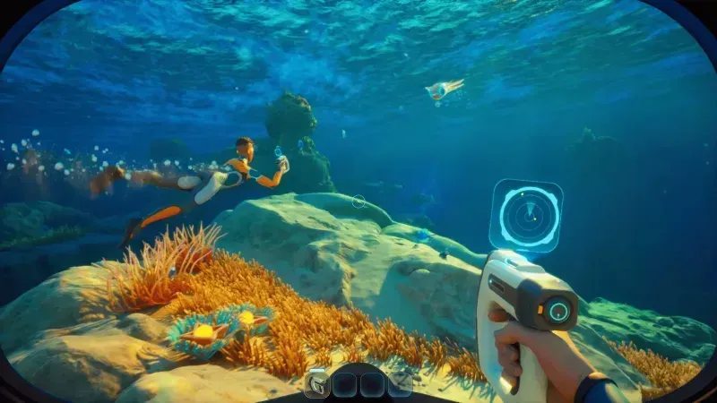 Subnautica 2 gameplay showing diver exploring ocean with scanner tool