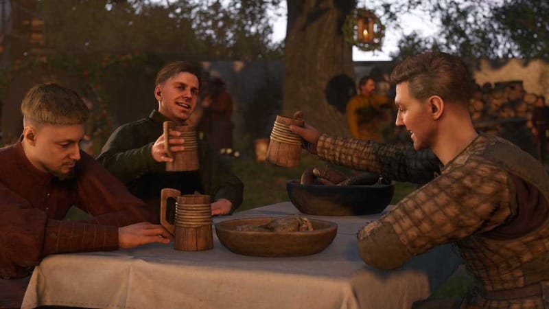 Characters in Kingdom Come: Deliverance II enjoying food and drinks at a medieval feast, raising wooden mugs in celebration.